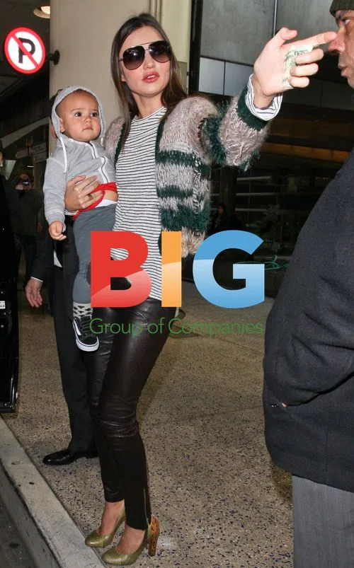Miranda Kerr with Baby Flynn at LAX