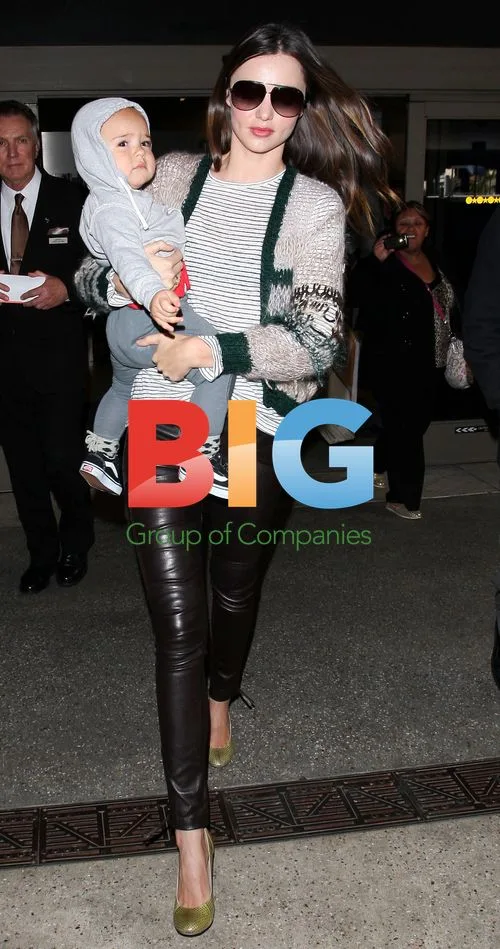 Miranda Kerr Arrives at LAX with Baby Flynn