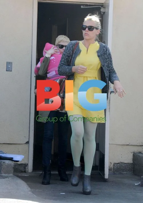 Busy Phillips and Michelle Williams leave café