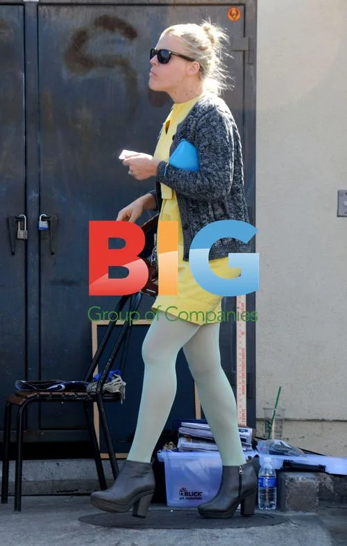 Busy Phillips and Michelle Williams Leave Cafe
