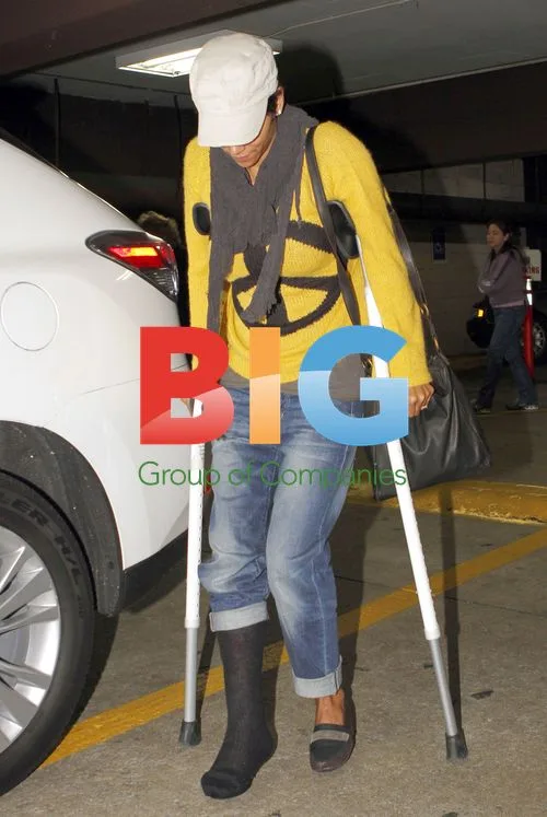 Halle Berry uses crutches in Burbank