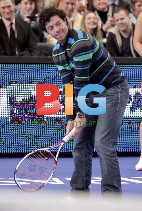 Caroline Wozniacki and Rory McIlroy at BNP Paribas Showdown