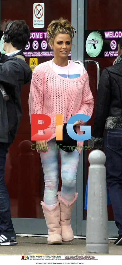 Katie Price Tumbles During Skiing Lesson