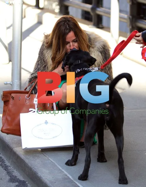 Kelly Bensimon kisses dog in NYC