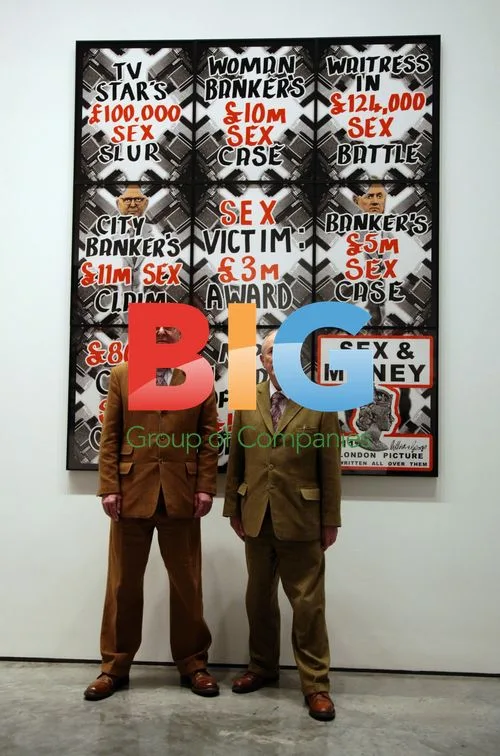 Gilbert and George pose at London Pictures exhibition