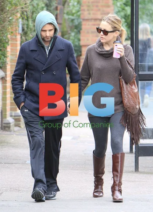 Kate Hudson and Matt Bellamy stroll in London