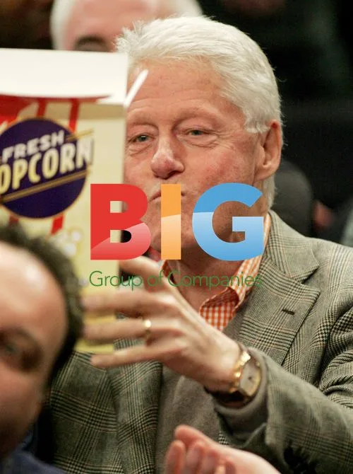 Bill Clinton and Spike Lee at NCAA Basketball