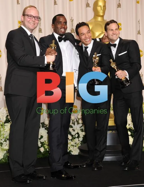 Diddy, T.J. Martin and Dan Lindsay at Oscars