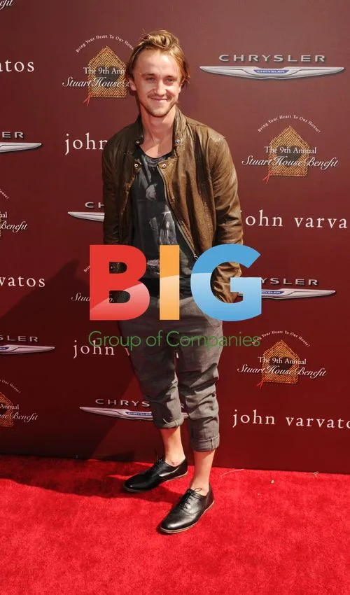 Tom Felton at John Varvatos Stuart House Benefit