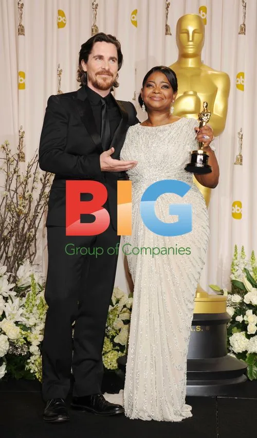 Christian Bale and Octavia Spencer at 84th Academy Awards