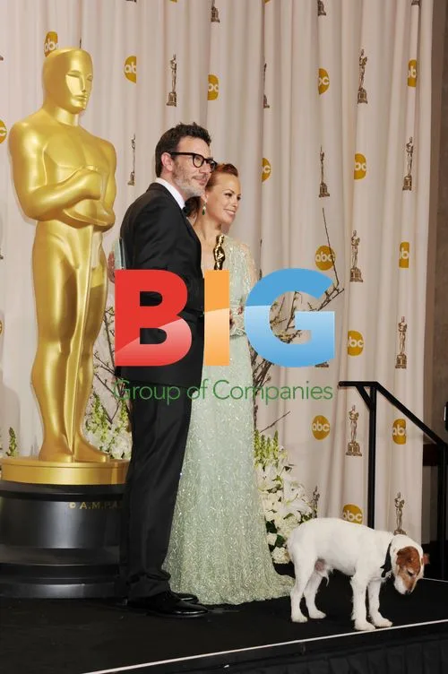 Michel Hazanavicius, Berenice Bejo and Uggie at Oscars