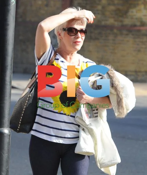 Denise Welch Hailing Taxi in London