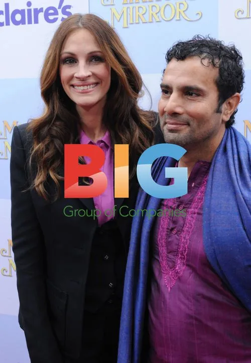 Julia Roberts and director Tarsem Singh at "Mirror Mirror" premiere
