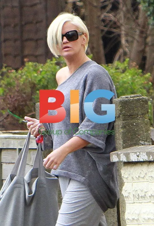 Kerry Katona stops for fan photo