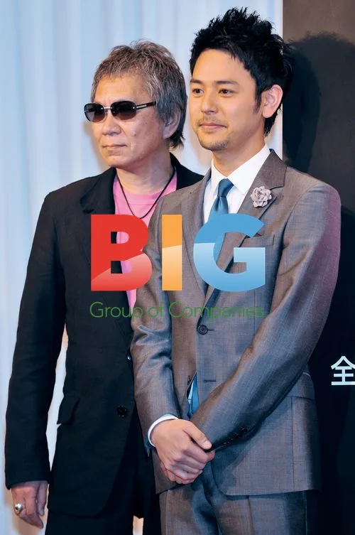 Satoshi Tsumabuki and Takashi Miike at film press conference
