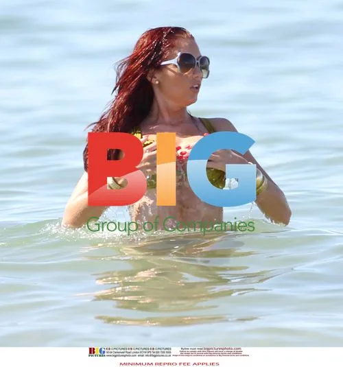 Amy Childs in Green Bikini on Vacation