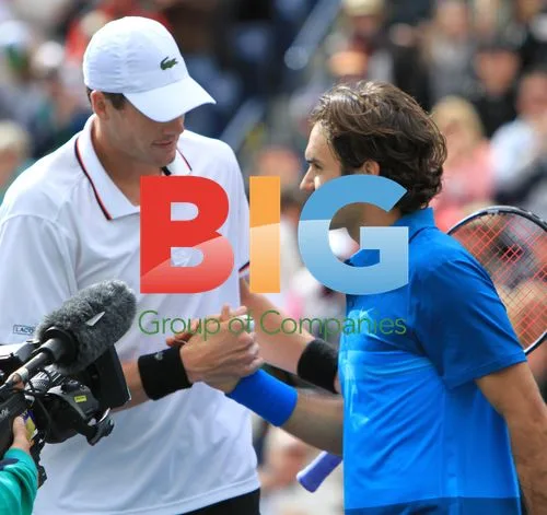 John Isner and Roger Federer at BNP Paribas Open