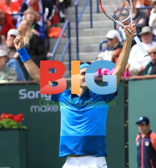 John Isner and Roger Federer at BNP Paribas Open