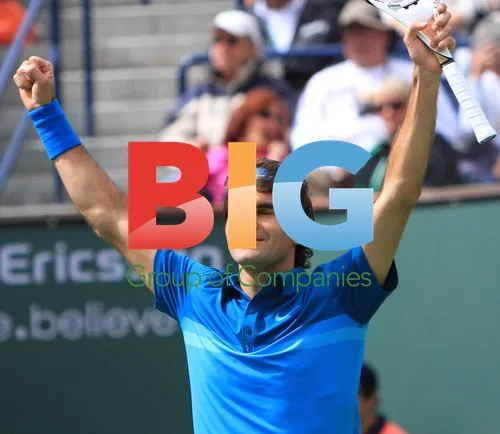 John Isner and Roger Federer at BNP Paribas Open