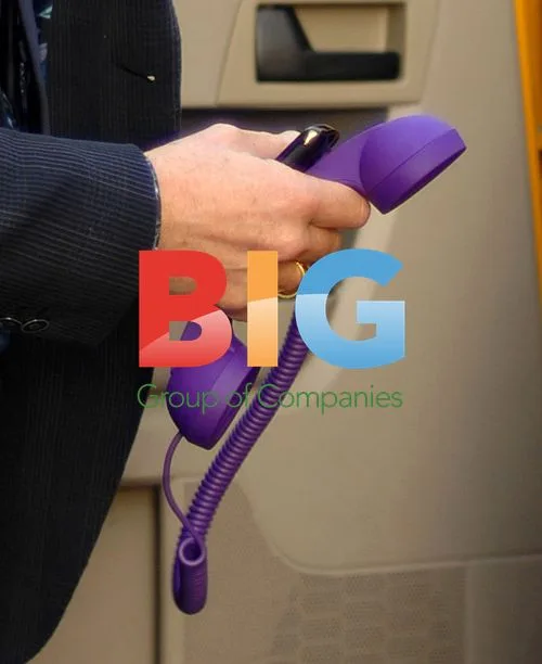 Elvis Costello in New York Taxi with Purple Phone