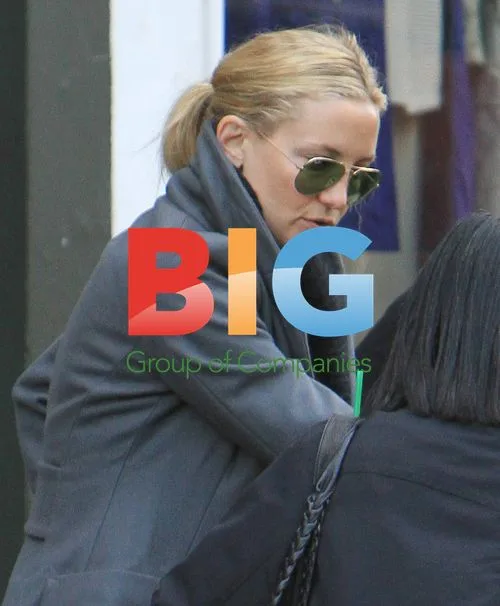 Kate Hudson Shops with Baby in London