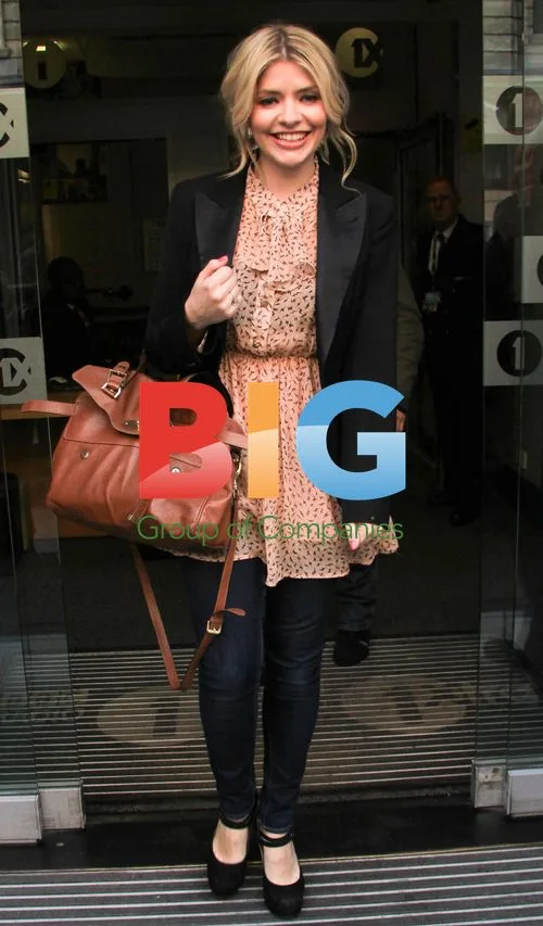 Holly Willoughby Leaving BBC Radio on Motorcycle