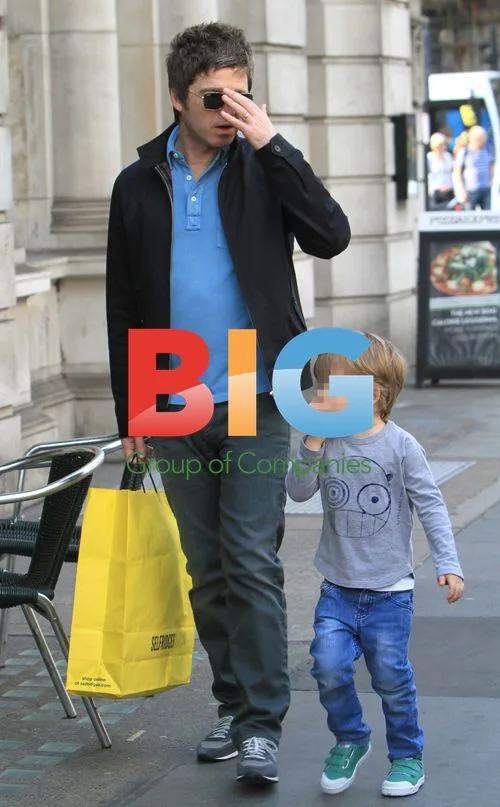Noel Gallagher with Son Shopping in London