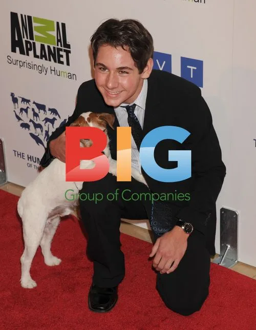 Dominic Scott Kay and Uggie the Dog at Genesis Awards