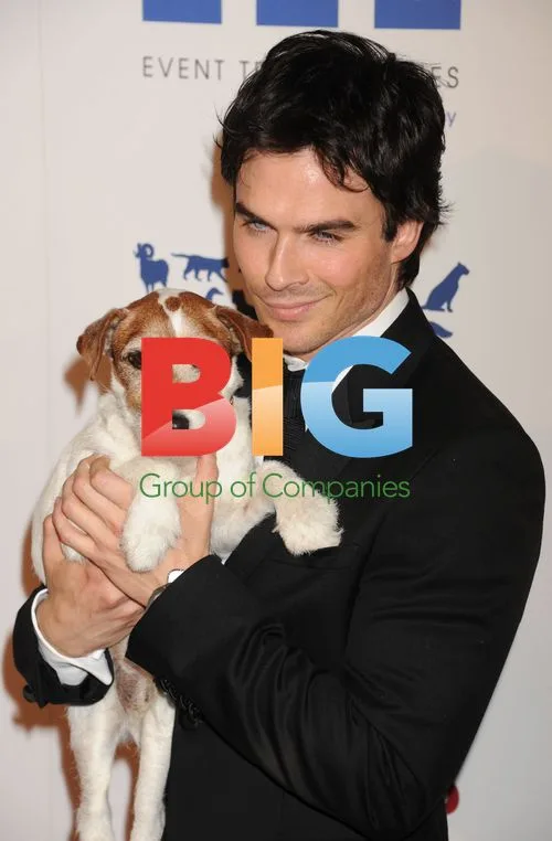Ian Somerhalder and Uggie the Dog at the 26th Genesis Awards