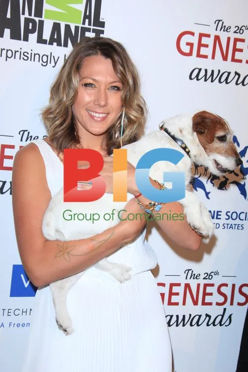Colbie Caillat and Uggie at 26th Genesis Awards