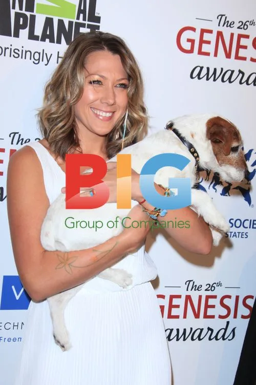 Colbie Caillat and Uggie at Genesis Awards