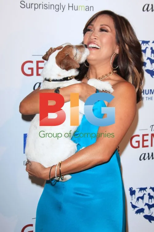 Carrie Ann Inaba and Uggie at 26th Genesis Awards
