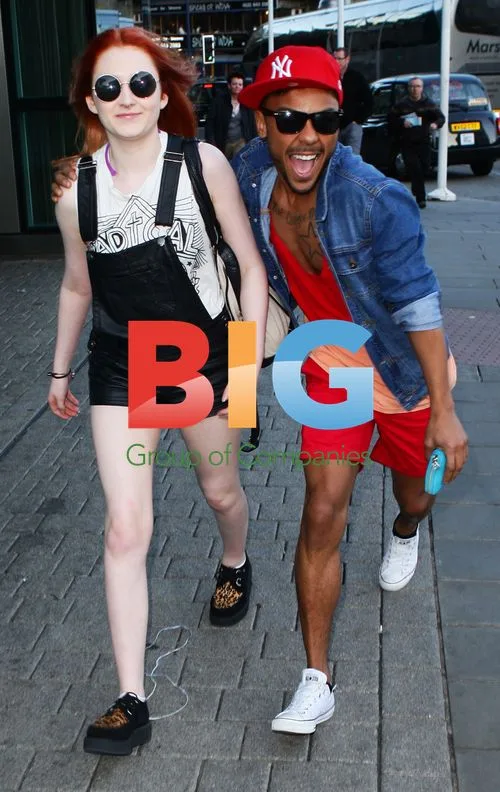 Marcus Collins and Janet Devlin Leaving Hotel