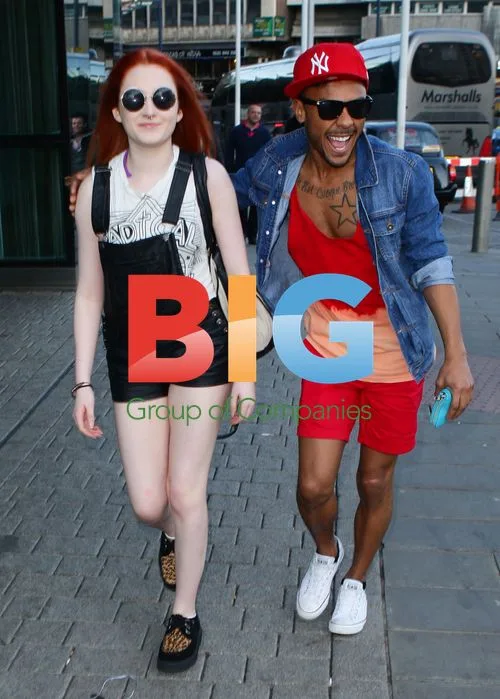 Marcus Collins and Janet Devlin leave hotel after X Factor tour
