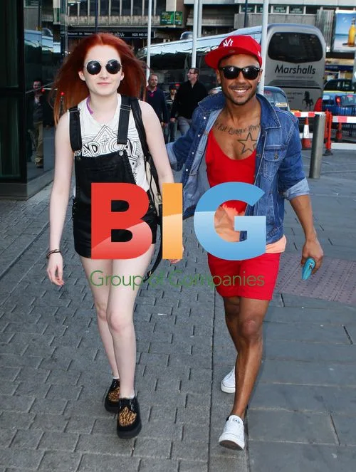 Marcus Collins and Janet Devlin Leaving Hotel