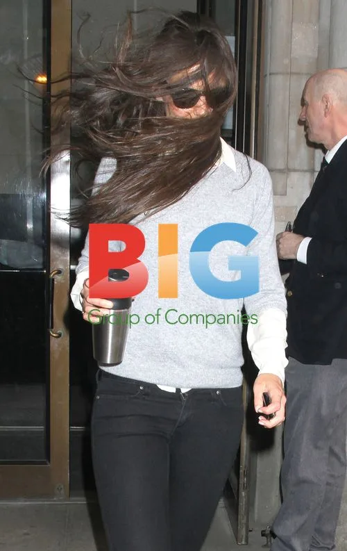 Katie Holmes Caught in the Wind