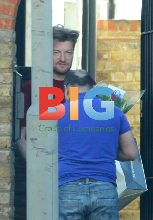 Charlie Brooker Receives Flowers at Home