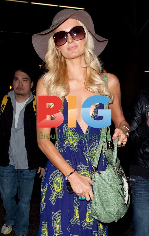 Paris Hilton Arrives at LAX