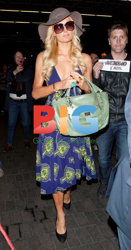 Paris Hilton Arrives at LAX