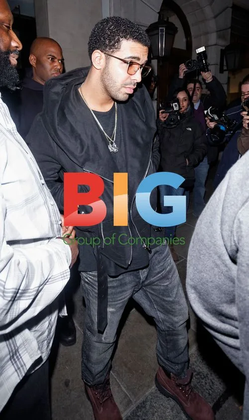 Singer Drake Leaving Aura Nightclub