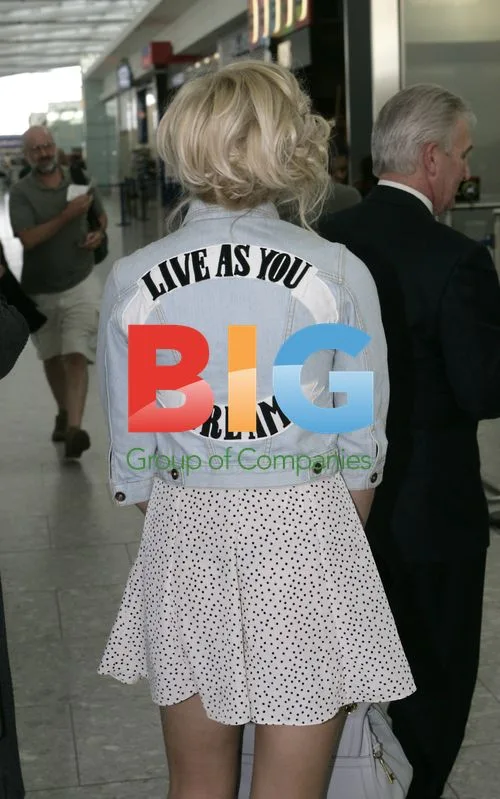 Pixie Lott Departs Heathrow for Japan