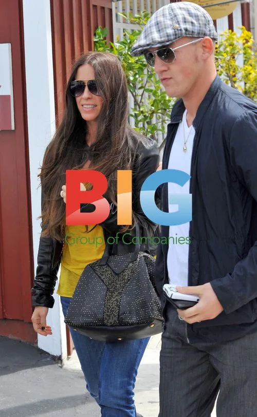 Alanis Morissette and husband out in Brentwood