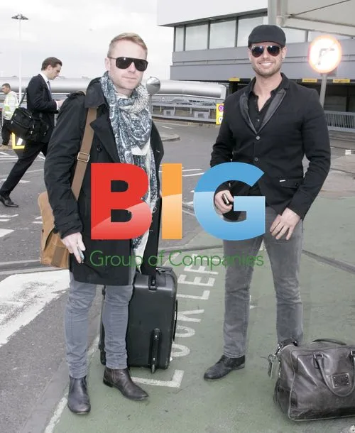 Boyzone Stars Ronan Keating and Keith Duffy Arrive at Heathrow