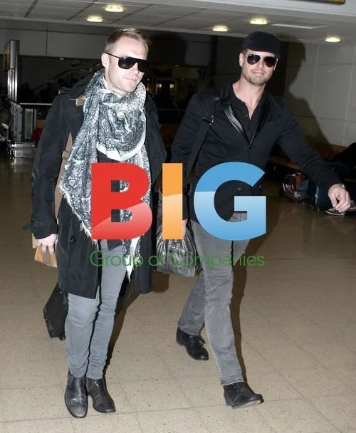 Boyzone Stars Arrive at Heathrow