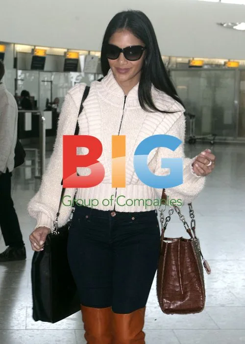 Nicole Scherzinger at Heathrow Airport