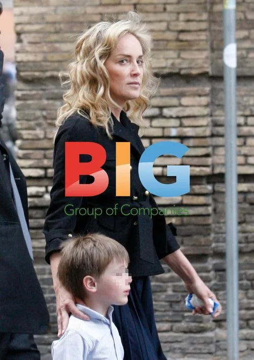 Sharon Stone and sons walking in Rome