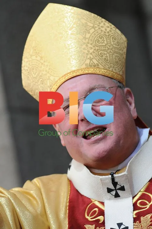 Cardinal Timothy Dolan greets Easter worshipers