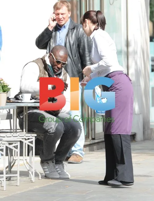 Sol Campbell Spotted in Deep Thought Over Paperwork