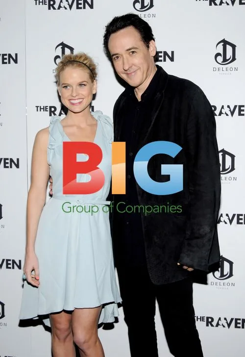 Alice Eve and John Cusack at Raven Premiere