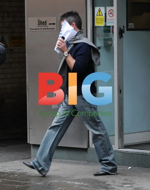 Simon Cowell Leaves Office in London